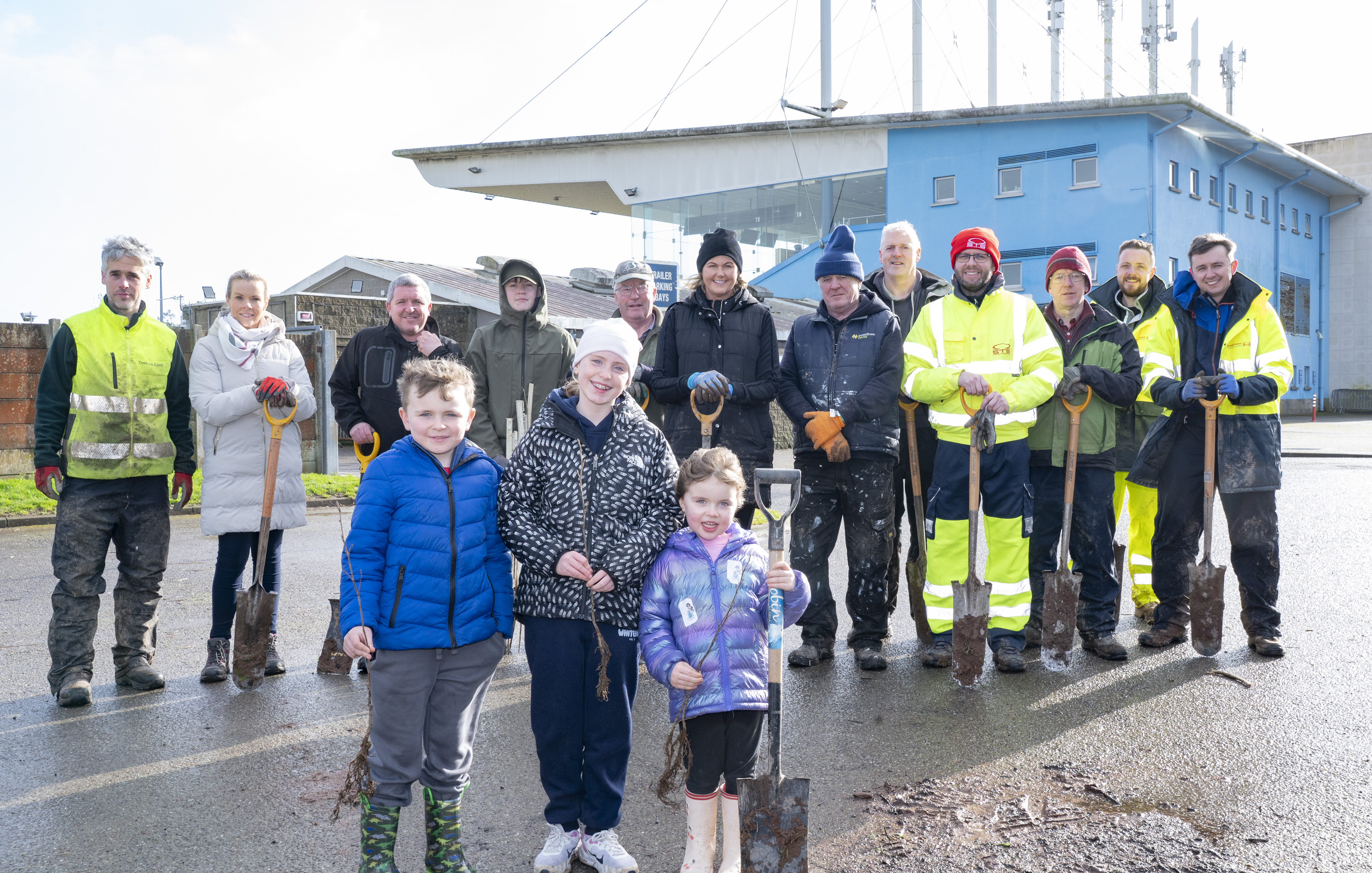 Community Volunteers and Families at Curraheen Park Tree Planting Volunteers, families, children, and representatives from STS Group Cork and Friends of Curraheen Park gather together at the stadium during the large-scale planting of native Irish trees.