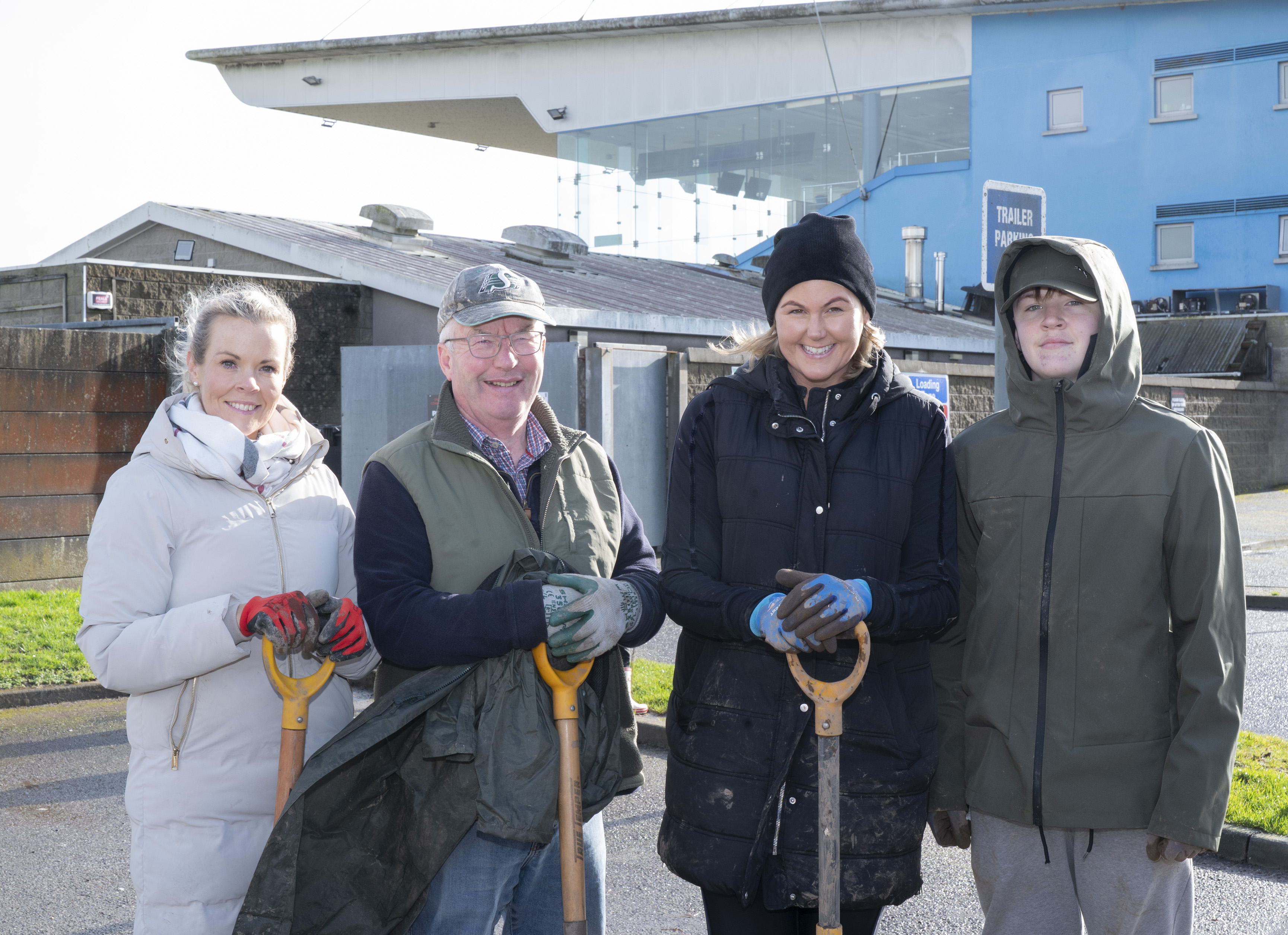 Community Tree Planting at Curraheen Park - Volunteers Members of the Friends of Curraheen Park Greyhound Stadium and volunteers from STS Group Cork pose with spades outside Curraheen Park Greyhound Stadium during the planting of 770 native Irish trees as part of a biodiversity initiative.