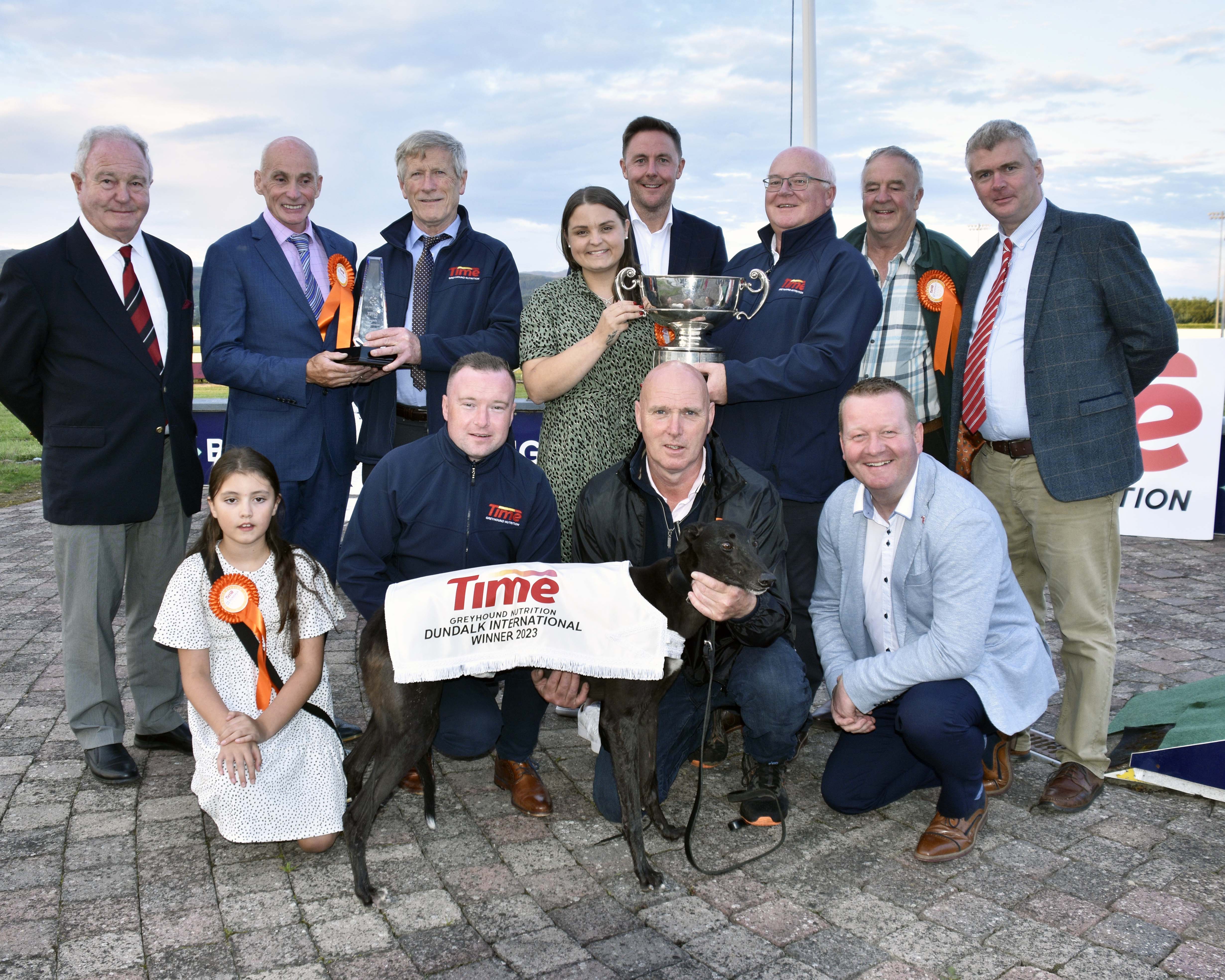 William Rigney presents the trophy to Marissa Molloy after Raha Mofo won the final of the 2023 Time Dundalk International and John Fox presents a replica trophy to Stephen Molloy. Also included are Leon Blanch Chief Commercial Officer GRI, Derek Frehill Director Of Racing GRI, Pat Herbert GRI, Shane Rigney Time, trainer Murt Leahy, handler Stephen Dunne and Leo McAuley Chairman Dundalk Track. William Rigney presents the trophy to Marissa Molloy after Raha Mofo won the final of the 2023 Time Dundalk International and John Fox presents a replica trophy to Stephen Molloy. Also included are Leon Blanch Chief Commercial Officer GRI, Derek Frehill Director Of Racing GRI, Pat Herbert GRI, Shane Rigney Time, trainer Murt Leahy, handler Stephen Dunne and Leo McAuley Chairman Dundalk Track.