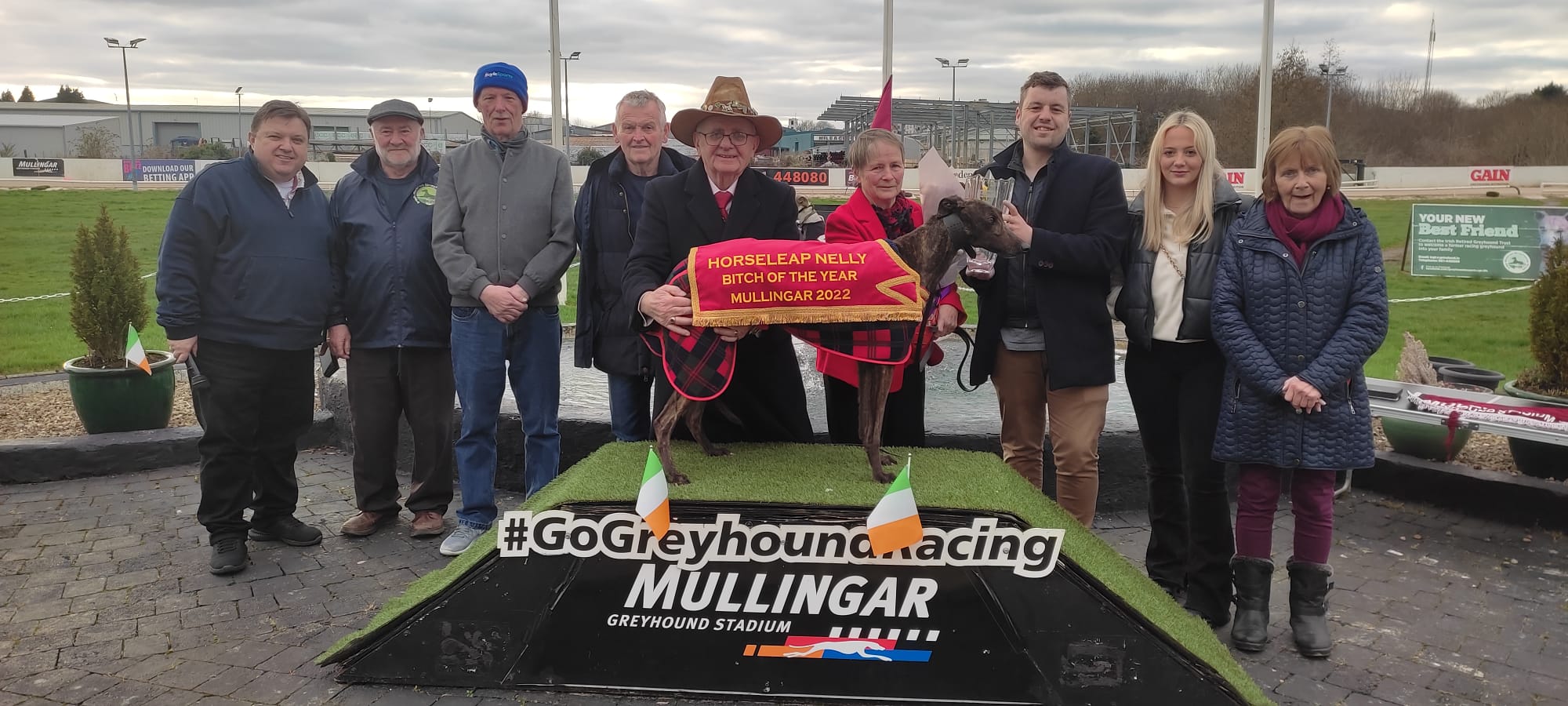 Ann and Sean McGuiness receiving the trophy for RPGTV Mullingar Greyhound of the Year for Horseleap Nelly who is pictured on the winner’s podium. Mark MaGuire makes the presentation on behalf of RPGTV with friends & family of the winners. 